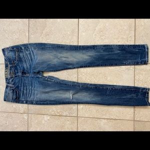 Skinny Buckle black jeans